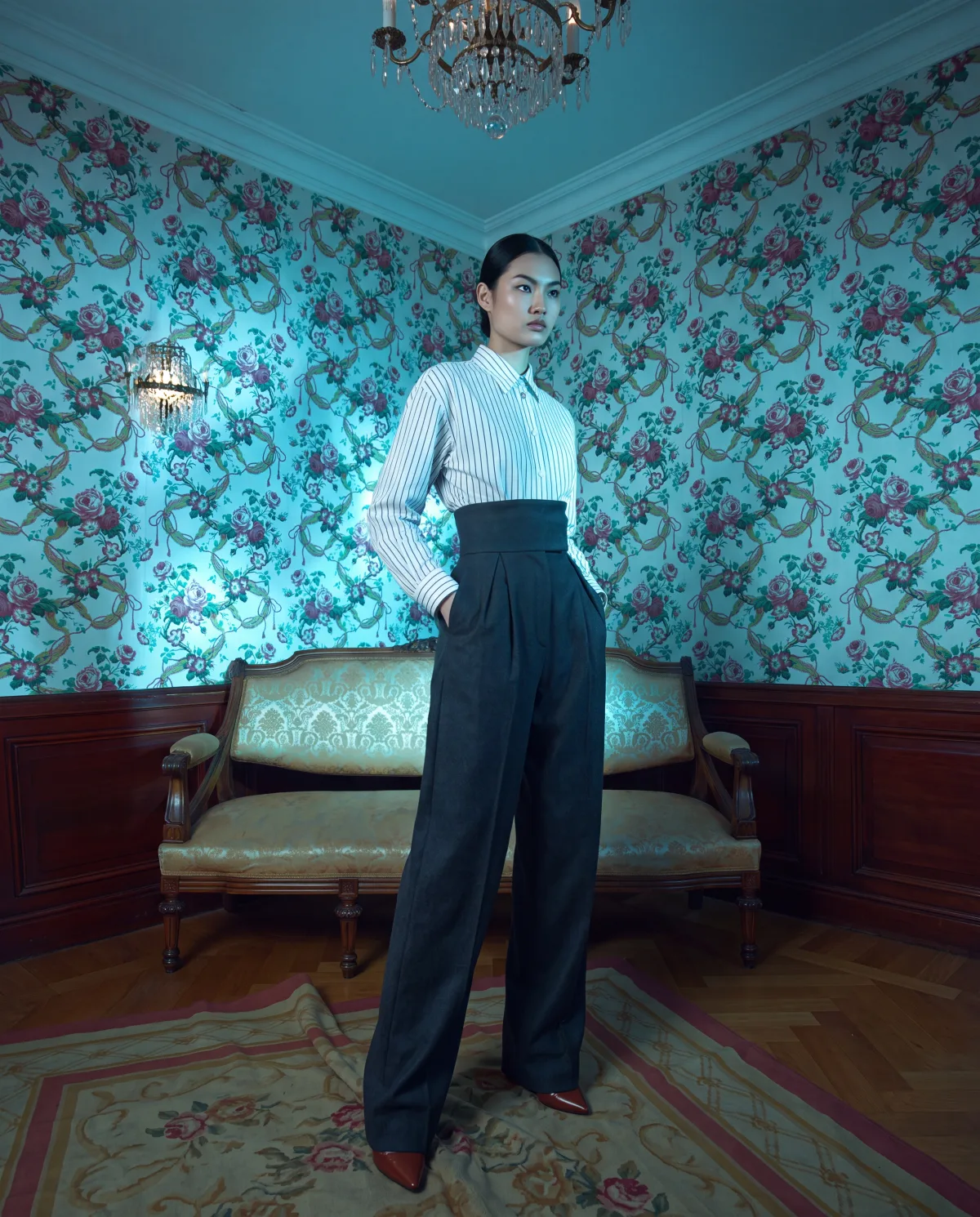 Finished fashion campaign image in a blue interior
